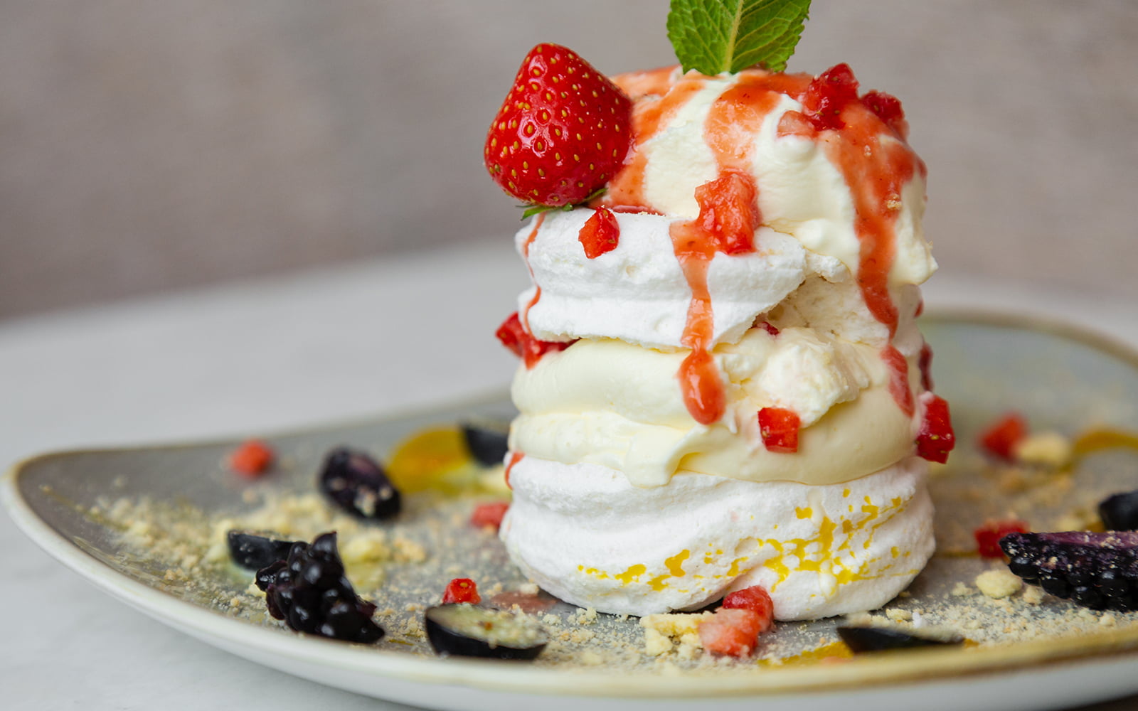 delicious meringue and cream dessert with berries